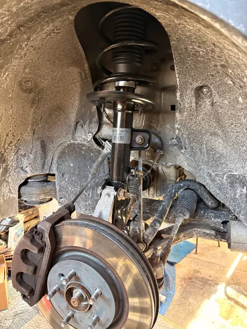 New strut assembly installed